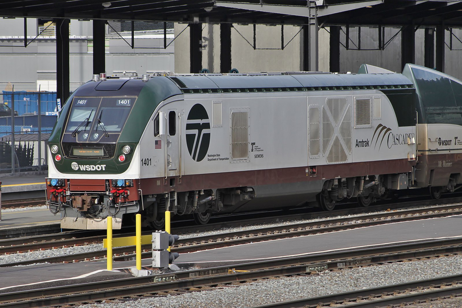 Siemens Charger engine waiting with Talgo train.